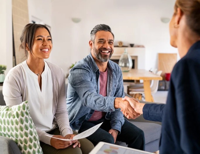 Couple meeting with advisor about CDs and IRAs